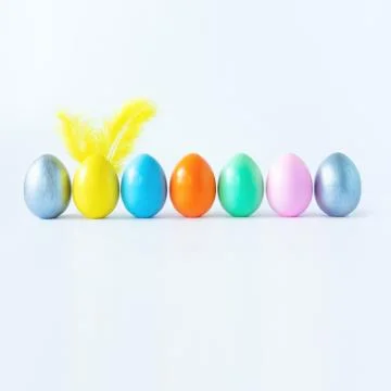 Top view of an easter composition of painted eggs in bright juicy colors on a Stock Photos