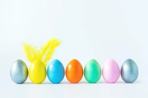 Top view of an easter composition of painted eggs in bright juicy colors on a Stock Photos