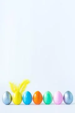 Top view of an easter composition of painted eggs in bright juicy colors on a Stock Photos