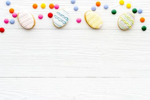Top view of Easter cookies eggs and sweets. Space for text 스톡 사진