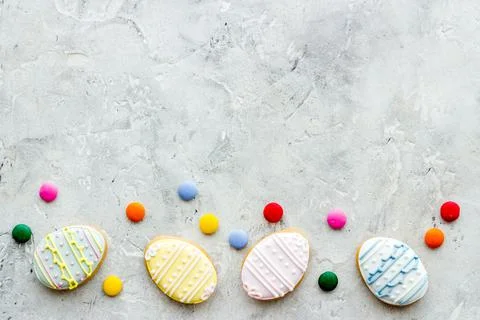 Top view of Easter cookies eggs and sweets. Space for text Stock Photos