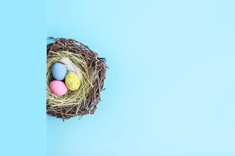 Top view of easter egg nest flat lay. Stock Photos