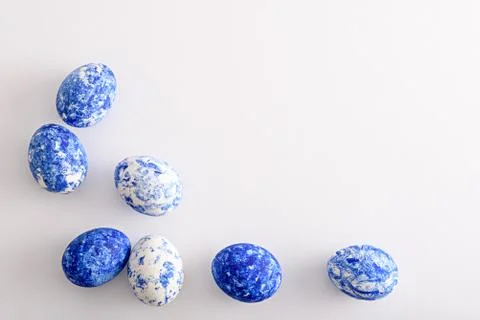 Top view Easter eggs in the color of the year-classic blue with gradient effe Stock Photos