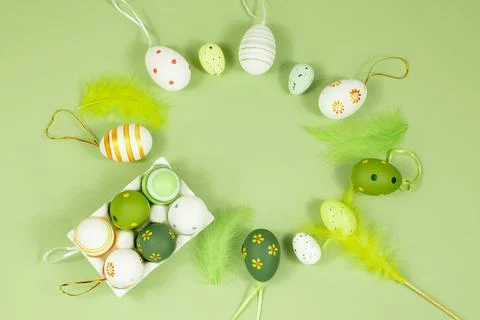 Top view of Easter eggs in an egg stand, painted with different patterns and Stock Photos