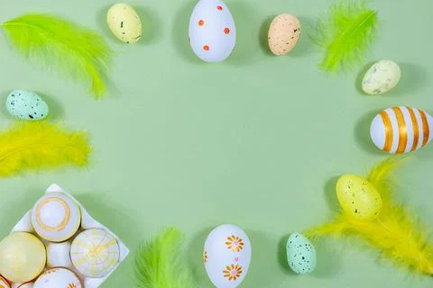 Top view of Easter eggs in an egg stand, painted with different patterns and Stock Photos