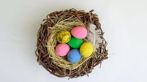Top view of Easter eggs in nest flat lay. Stock Photos