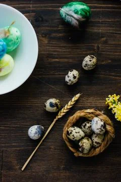Top view of easter table with colored eggs on it. Stock Photos