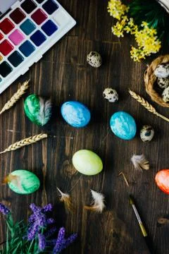 Top view of easter table with colored eggs on it. Stock Photos