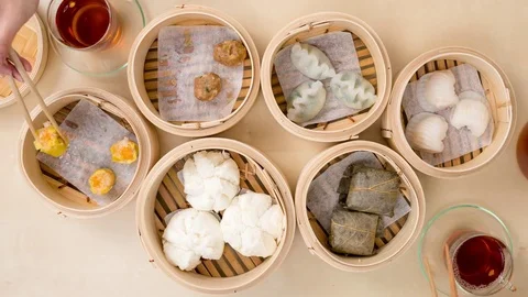 Top view of eating chinese dim sum at home Stock Footage 77006641
