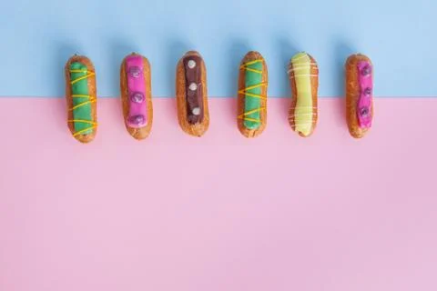 Top view of eclairs in a row with copy space Stock Photos