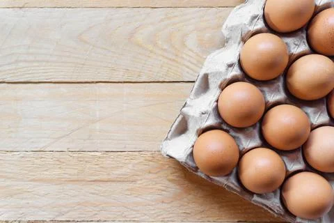 Top view eggs in package on table with copy space Stock-Fotos