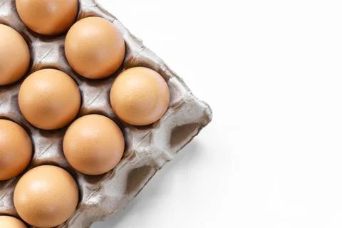 Top view eggs in package on white background Stock Photos