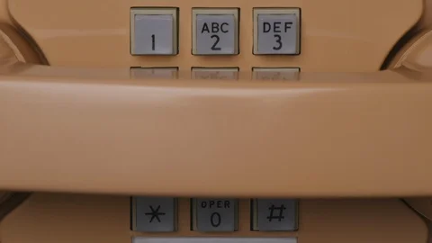 Top View Elderly Man Dialing Number Buttons On Retro Push Dial Telephone. Making Stock Footage 129781082