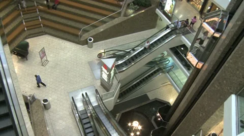 Top view of elevators and escalators moving within mall (1 of 2) Stock Footage 32327026