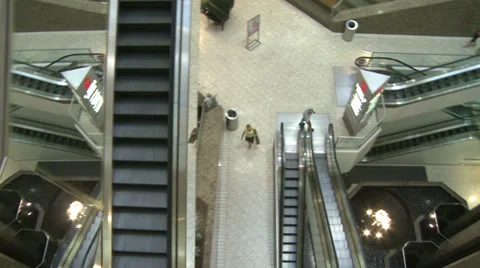 Top view of elevators and escalators moving within mall (2 of 2) Stock Footage 32327029
