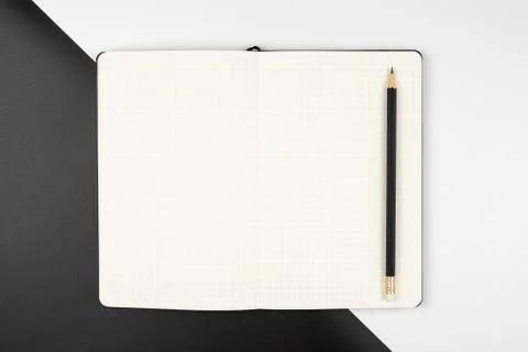 Top view of an emptry grid notebook with pencil Stock Photos