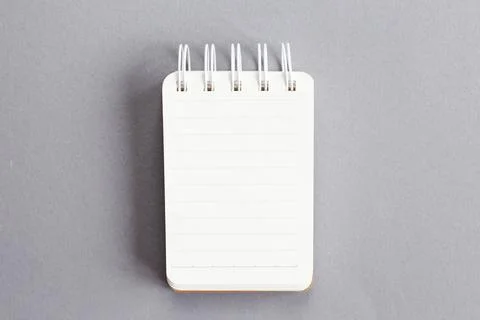 Top view of empty blank note paper on gray background Stock Photos