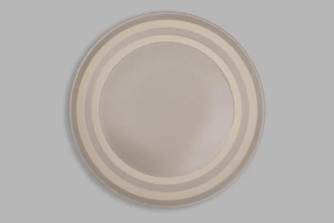 Top view-Empty brown ceeamic round dish plate isolated on grey background Stock Photos