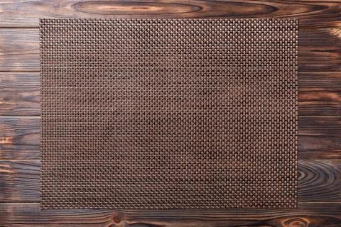 Top view of empty brown tablecloth on wooden background with copy space Stock Photos