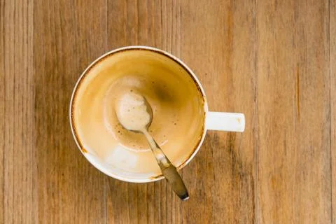 Top view an empty coffee cup on wooden table after drink Stock Photos