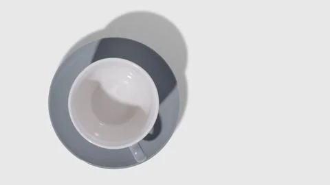 Top view of empty coffee cup and saucer on white background Stock Photos