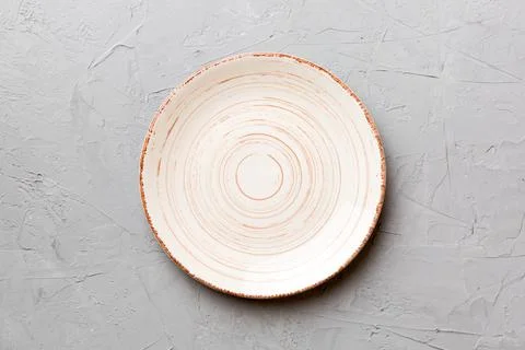Top view of empty colorful plate on wooden background. Empty space for your d Stock Photos