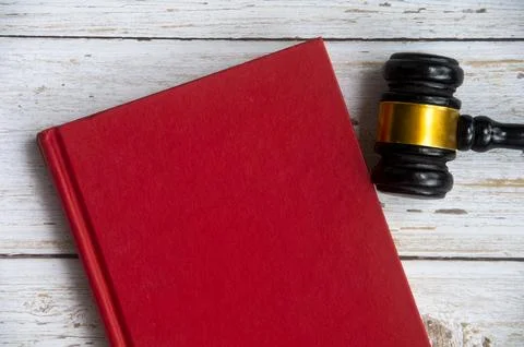 Top view of empty cover red book with gavel. Copy space Stock Photos