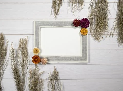 Top view of an empty frame with floral decors Stock Photos