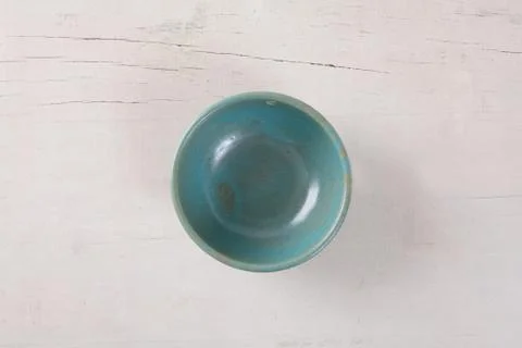Top view of empty green plate put on white wood table with space for copy. Stock Photos