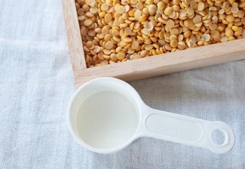 Top View of Empty Measuring Spoon with Dried Soybeans Stock Photos