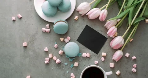 Top View, Empty Note on Table with Background of Macarons and Tulips Stock Footage 131511681