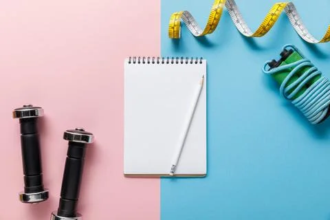 Top view empty notebook dumbbells Stock Photos