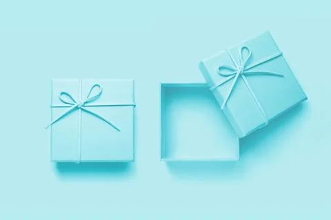 Top view of empty open gift box for congratulations on blue background. Stock Illustration