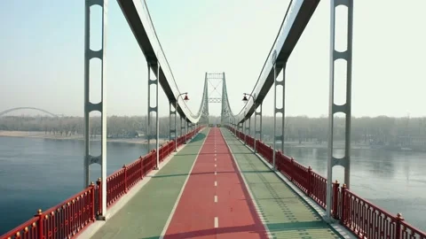 Top view of an empty pedestrian bridge across the river in Kiev, Ukraine Stock Footage 238999644