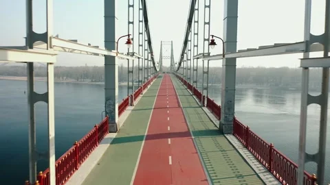 Top view of an empty pedestrian bridge across the river in Kiev, Ukraine Stock Footage 241336915