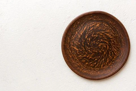Top view of empty plate on cement background. Empty space for your design Stock Photos