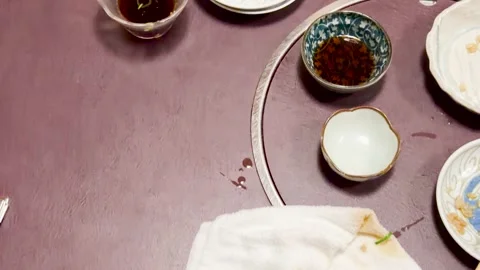 Top View of Empty Plates and Leftovers on a Japanese Dining Table Stock Footage 332261606