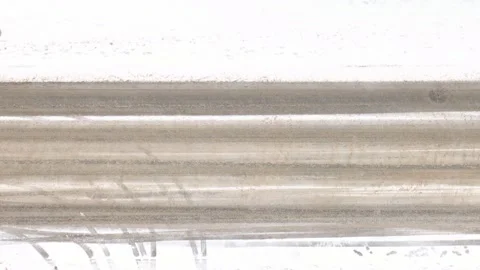 Top view to the empty road in snowing weather. 4K Stock Footage 197954266