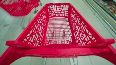 Top view of the empty shopping cart without food. Timelapse of shopping at the Stock Footage 207076238