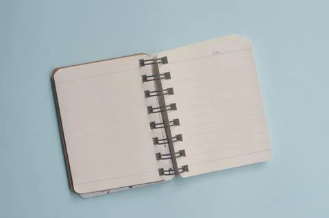 Top view empty space from a notebook and blue background Stock Photos