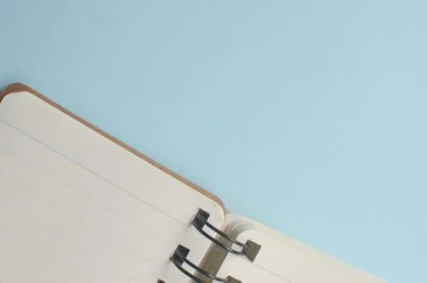 Top view empty space from a notebook and blue background Stock Photos