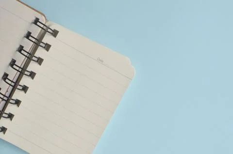 Top view empty space from a notebook and blue background Stock Photos