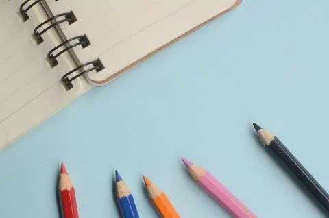 Top view empty space from a notebook and blue background Stock Photos