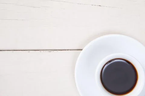 Top view of empty white cup coffee with black coffee put on white wood table  Stock Photos