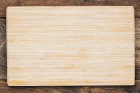 Top view of an empty wooden rectangular cutting board Stock Photos