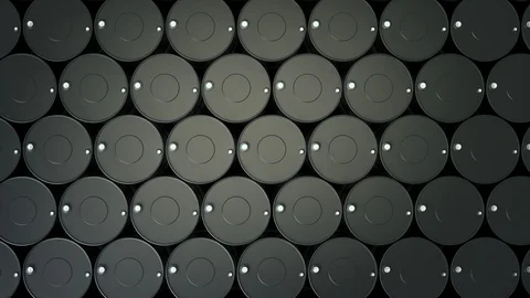 Top view of endless stack of black metal oil barrels. 動画素材 119351321