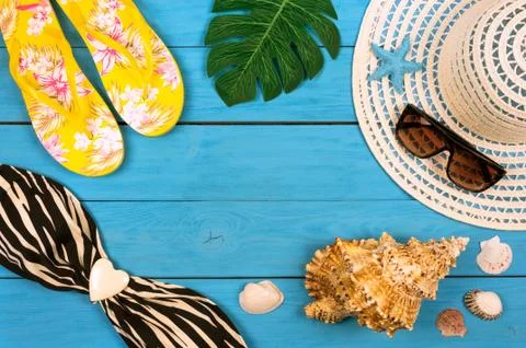 Top view of essential modern young lady or girl on vacations.Woman's summer h Stock Photos