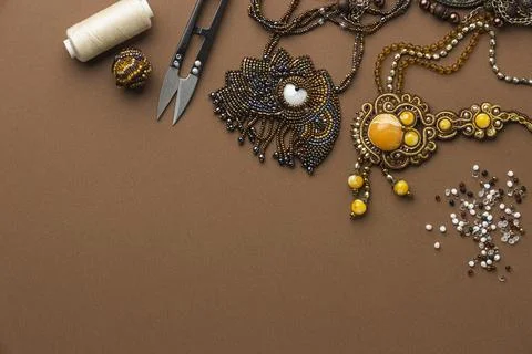 Top view essentials bead working with thread scissors Stock Photos