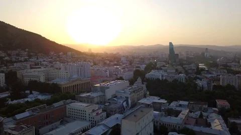 Top view of the evening city on a sunset background. Beautiful panorama. Stock-Footage 106087452