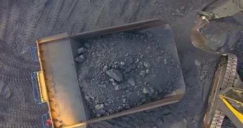 Top view excavator loads coal Stock Footage 122076932